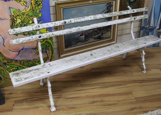 A garden bench with cast iron ends W.210cm